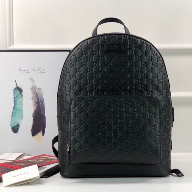 G*u*i backpacks